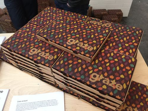 A stack of colourful Graze boxes.