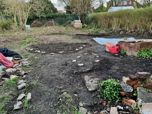 A path down the front of the allotment, by the coldframe. It's made of bare earth. Though it has been disturbed it looks fairly level, not like multiple barrows of soil has been moved.